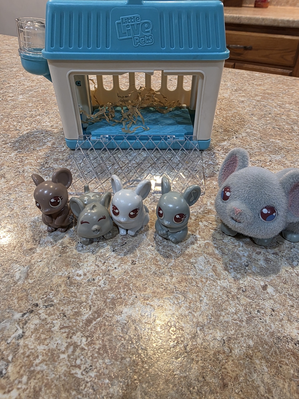 Small Playset with Blue and White Hutch and Gray Figures